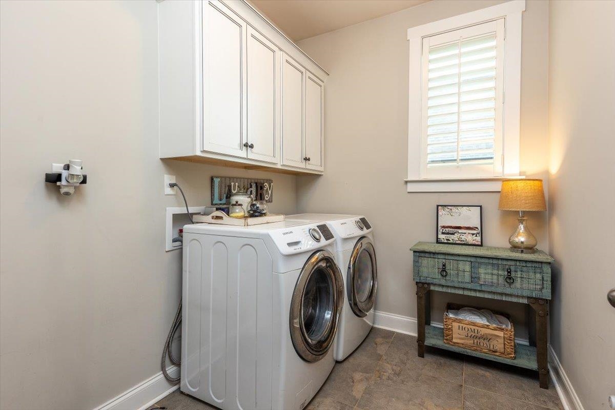 608 Cypress Run Cove Collierville, TN 38017 - Photo 16 of 40 Laundry room with cabinet space and independent washer and dryer