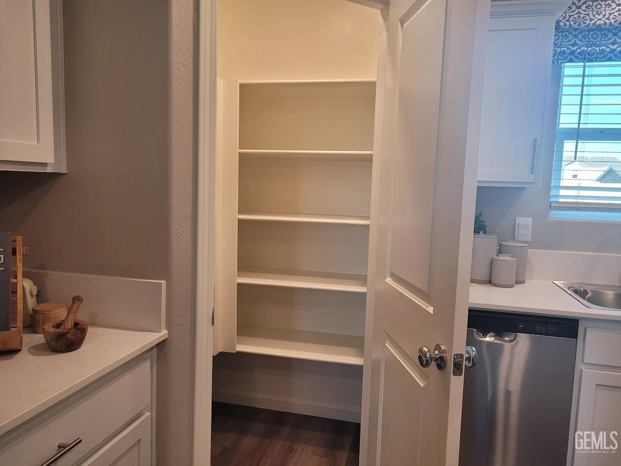 Undisclosed Address Bakersfield, CA 93313 - Photo 5 of 25 a room with a sink and cabinets