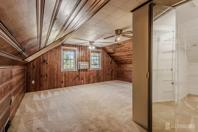 a view of a porch with wooden floor and stairs