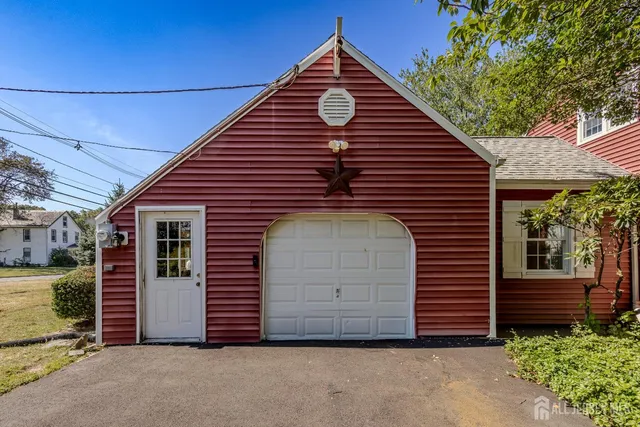 a view of a bench in a backyard