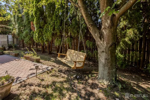 a view of backyard of the house