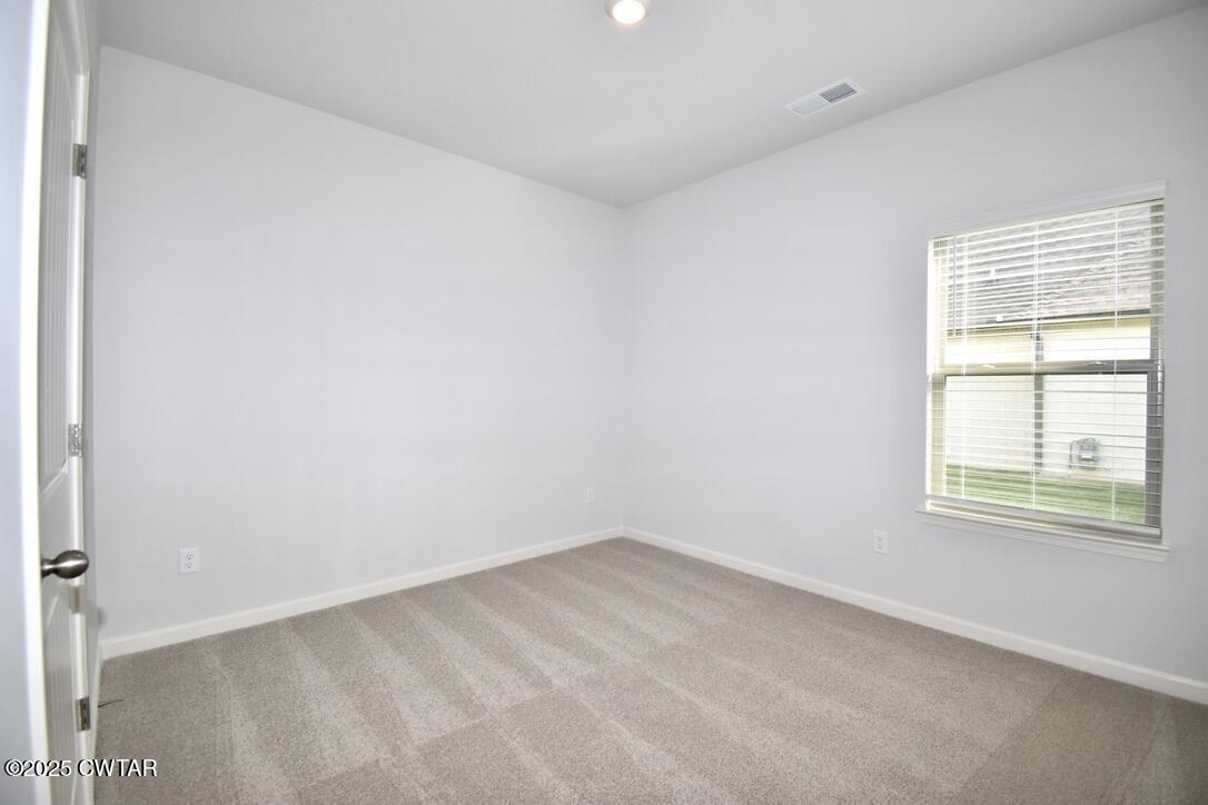 44 Clarendon Cove Jackson, TN 38305 - Photo 15 of 17 an empty room with a window