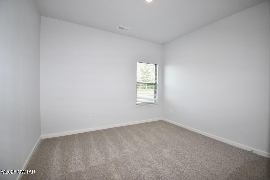 44 Clarendon Cove Jackson, TN 38305 - Photo 16 of 17 an empty room with a window