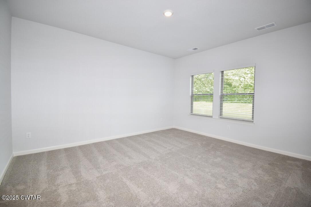 44 Clarendon Cove Jackson, TN 38305 - Photo 10 of 17 an empty room with windows
