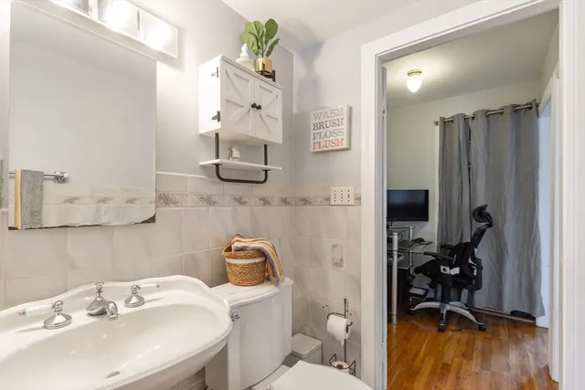 a bathroom with a sink and a toilet