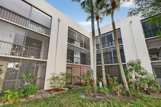 a kitchen with a sink and a microwave