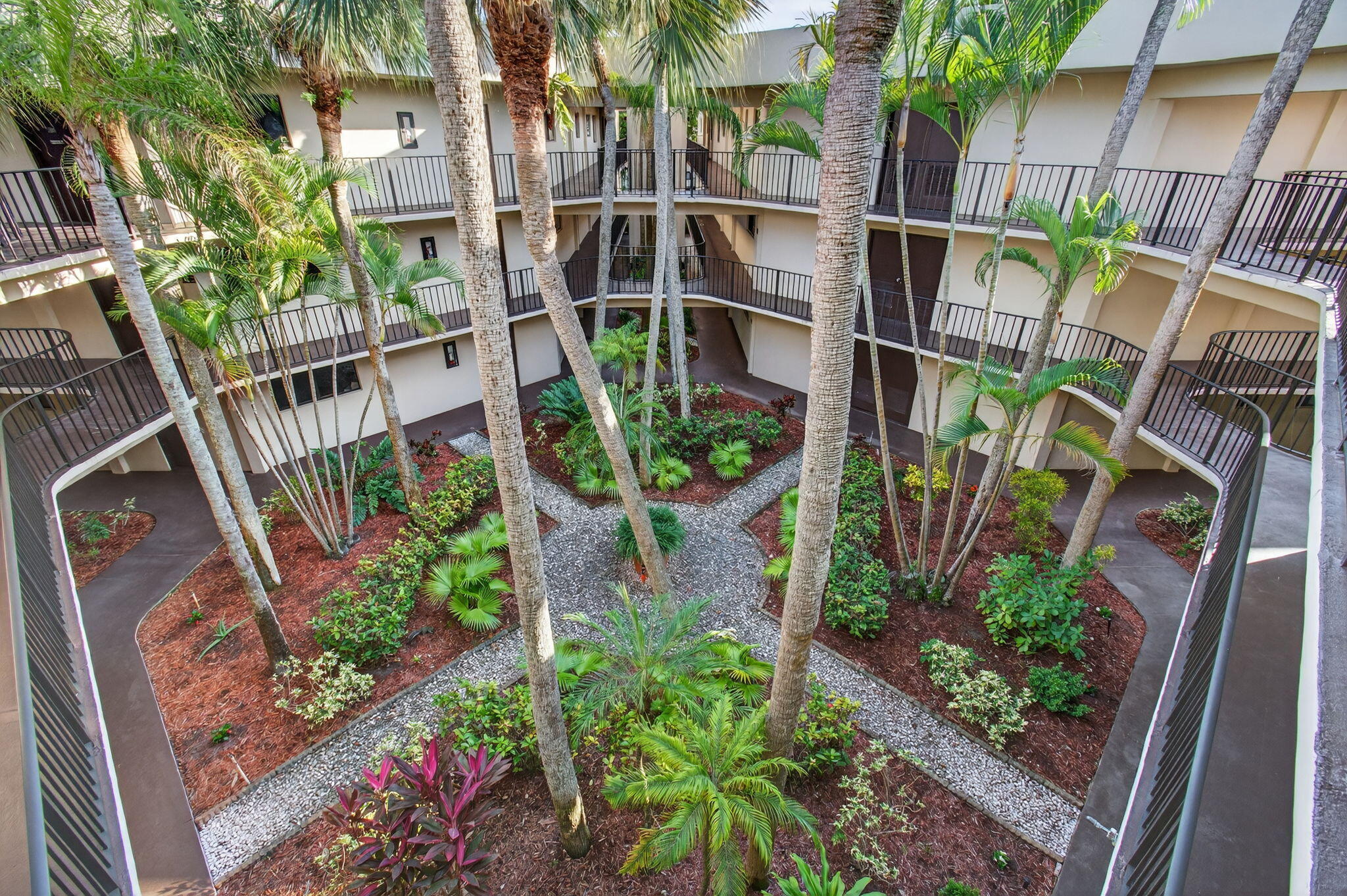 5220 Las Verdes Circle, Unit 322 Delray Beach, FL 33484 - Photo 4 of 65 a view of outdoor space and garden