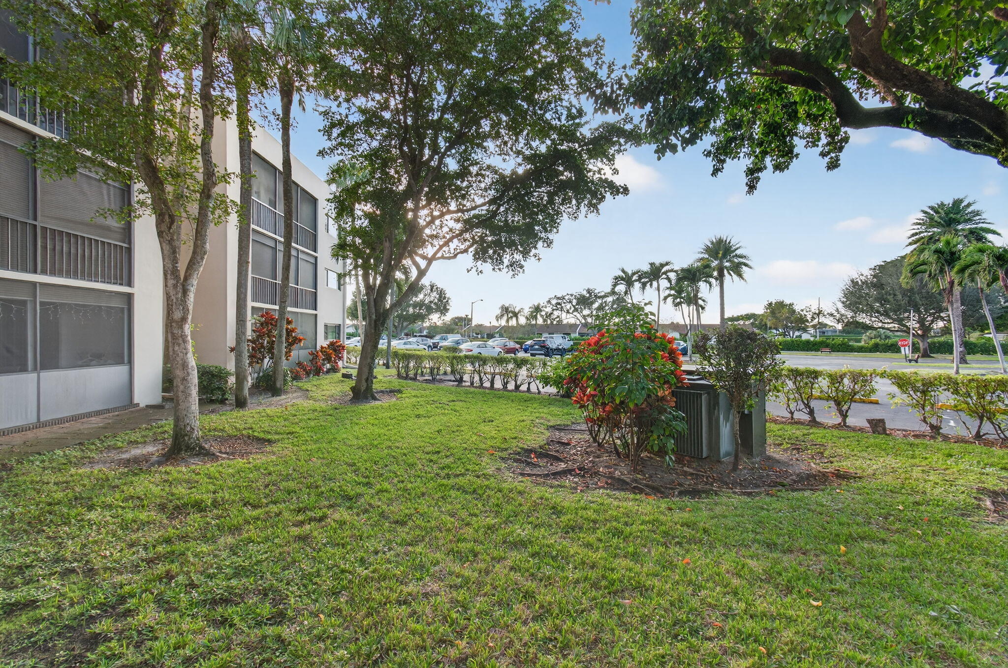 5220 Las Verdes Circle, Unit 322 Delray Beach, FL 33484 - Photo 41 of 65 a view of a park with large trees