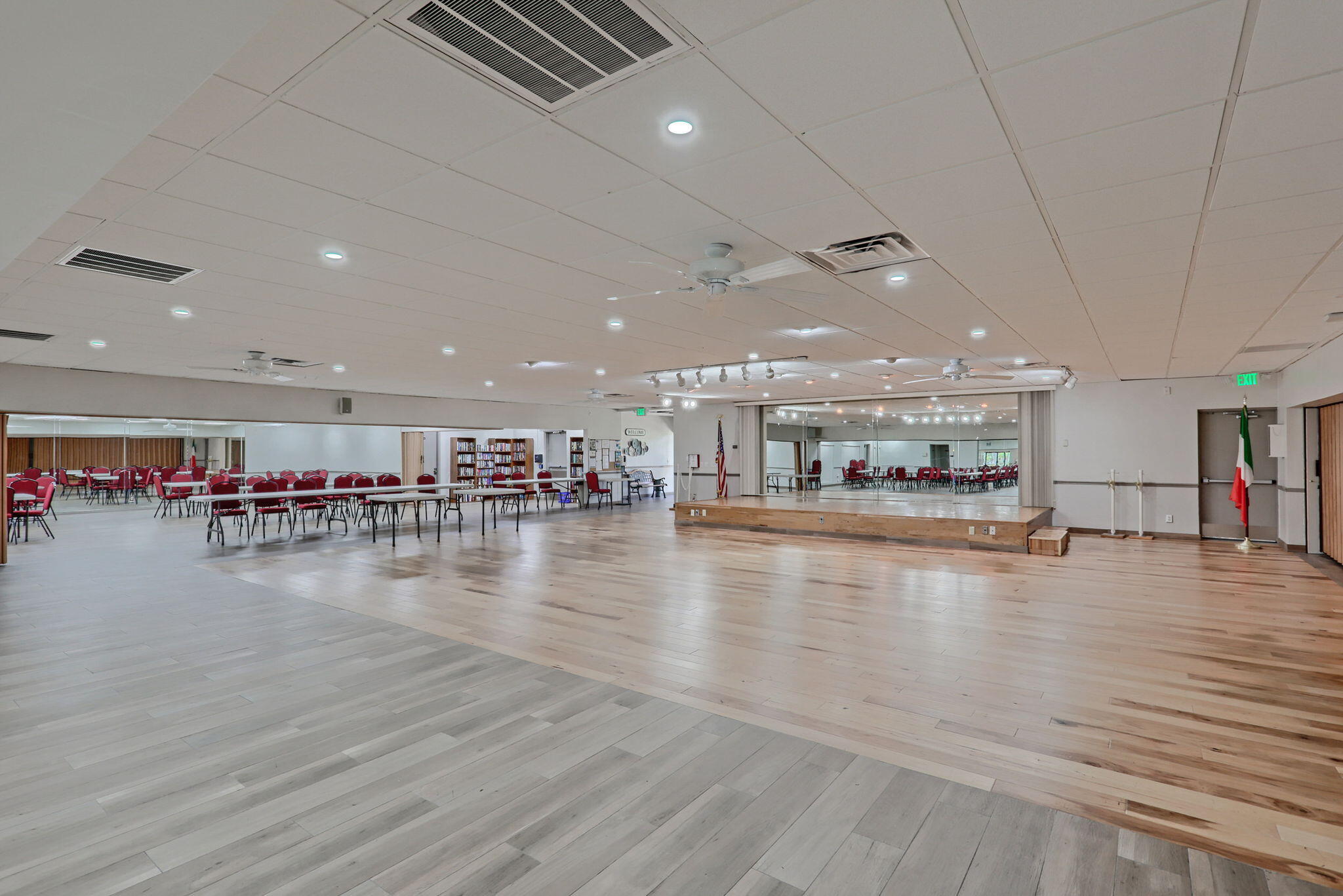 5220 Las Verdes Circle, Unit 322 Delray Beach, FL 33484 - Photo 50 of 65 a view of an empty room with wooden floor