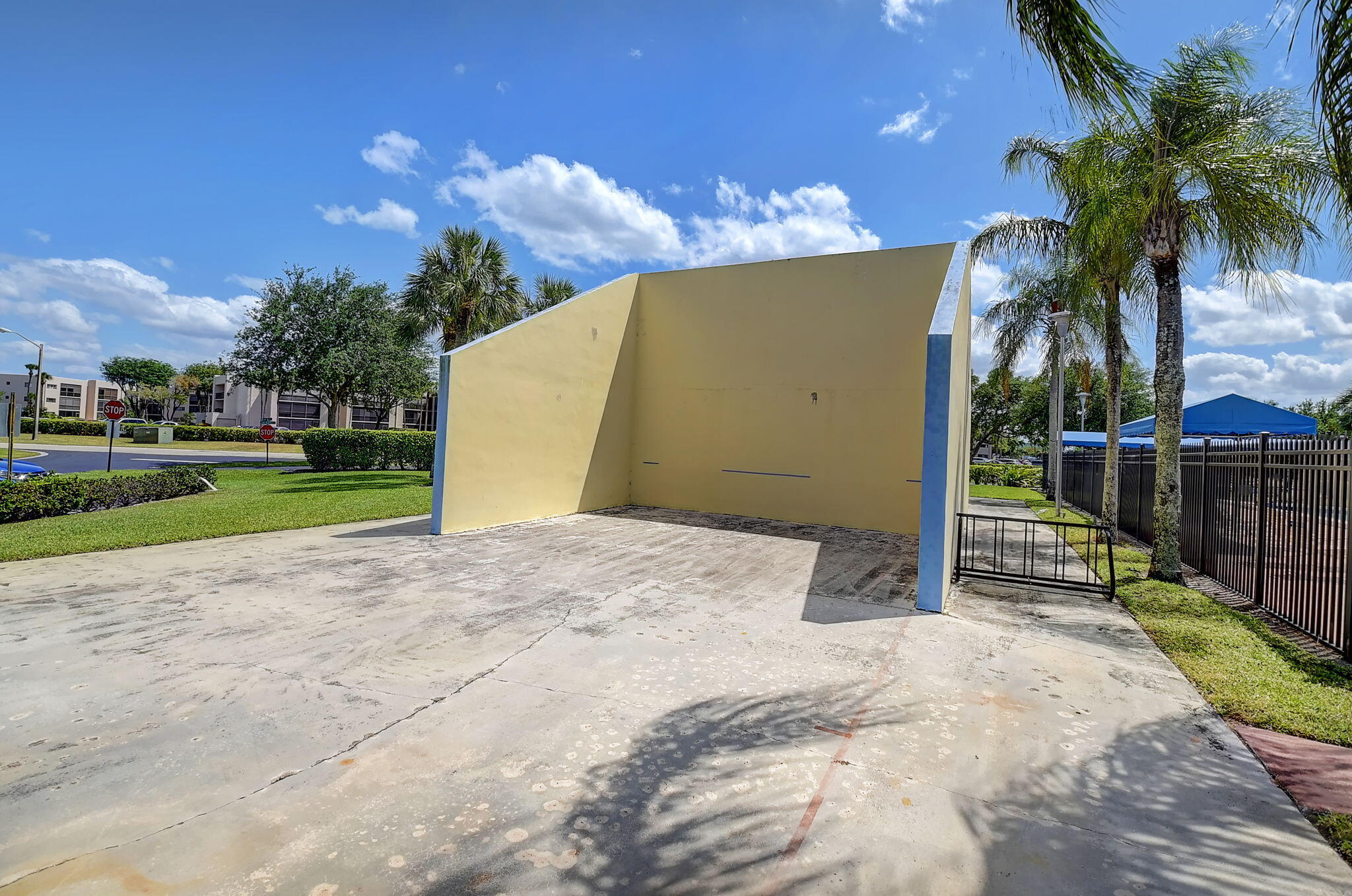5220 Las Verdes Circle, Unit 322 Delray Beach, FL 33484 - Photo 58 of 65 a view of a backyard