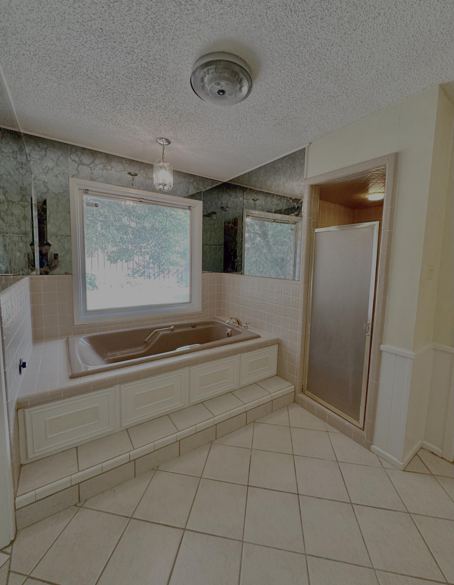 4610 88th Street Lubbock, TX 79424 - Photo 13 of 20 a view of a livingroom with furniture and front door
