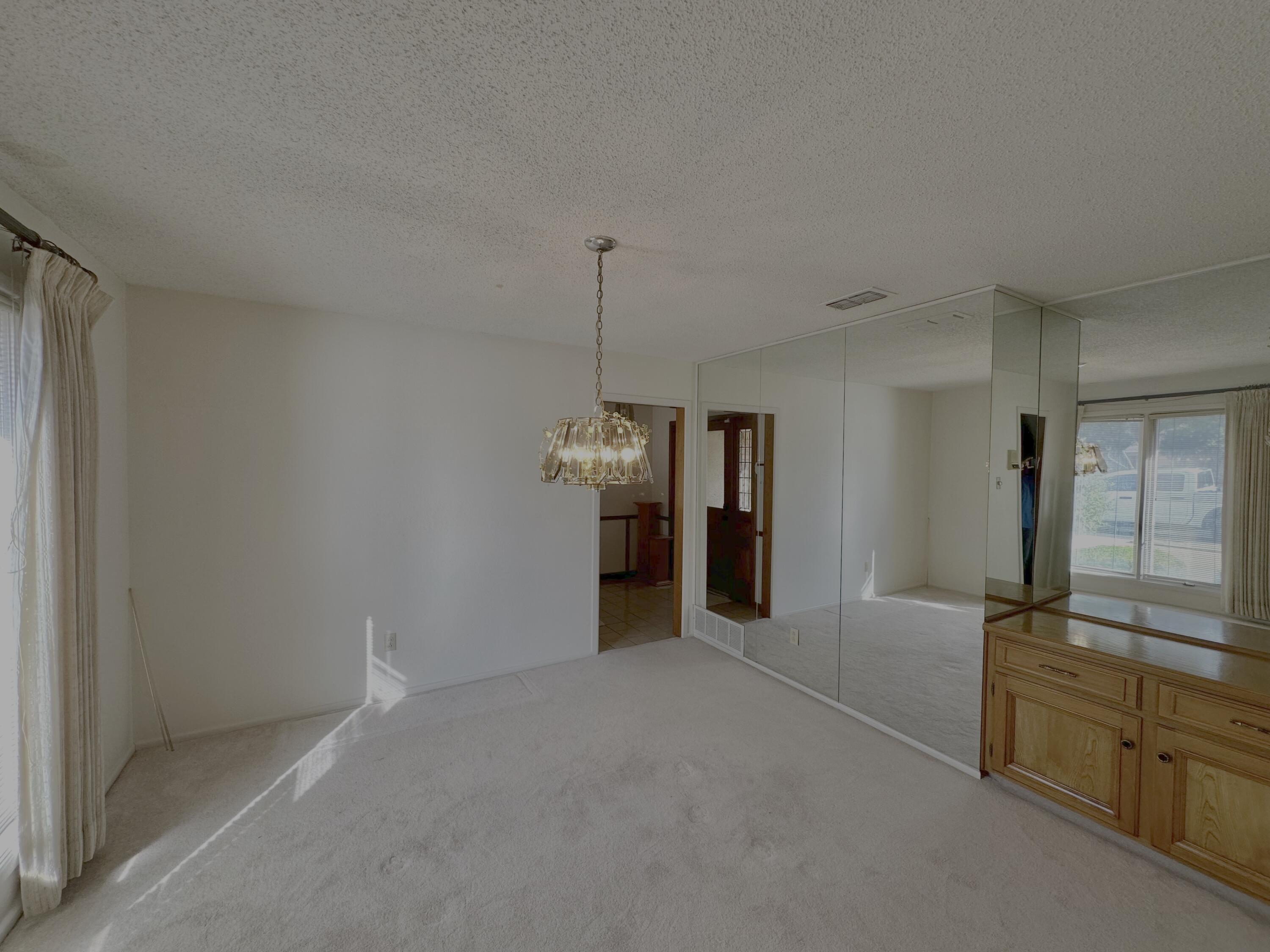 4610 88th Street Lubbock, TX 79424 - Photo 7 of 20 a view of a room with window and furniture