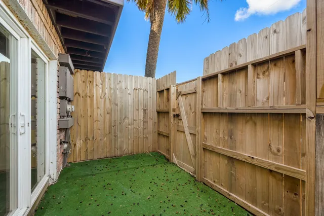 a view of a back yard of the house