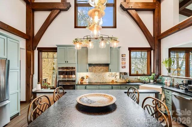 a kitchen with a sink and stove