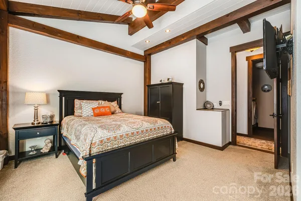 a dining room with table and chairs