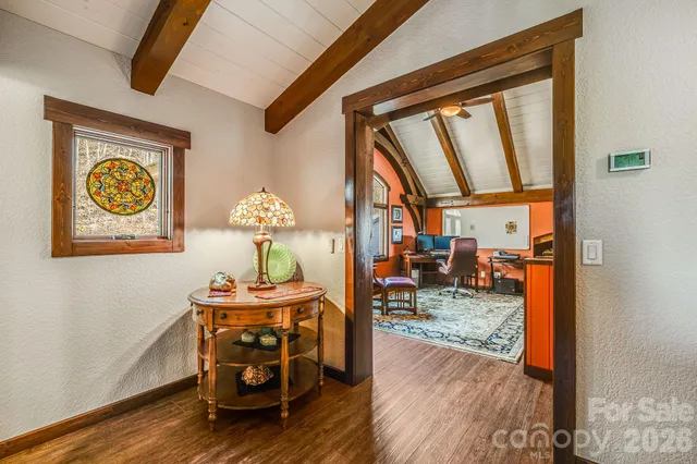 a room with furniture and a fireplace