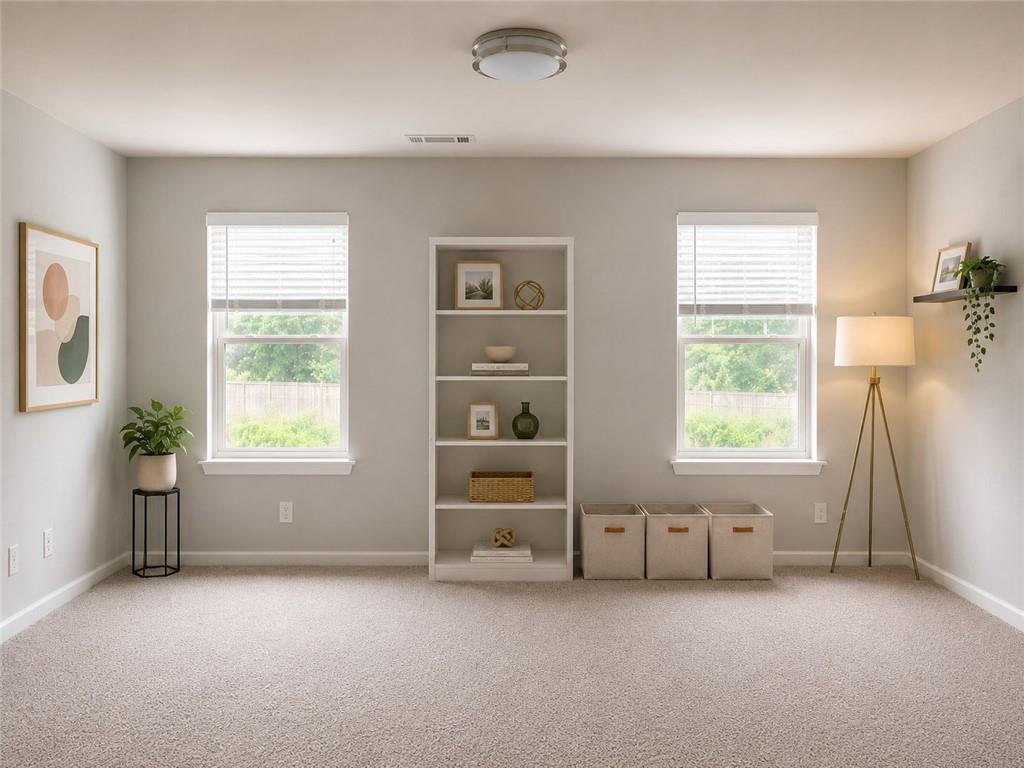 3359 Elkhorn Ridge Run Dacula, GA 30019 - Photo 19 of 35 a view of an empty room with a window