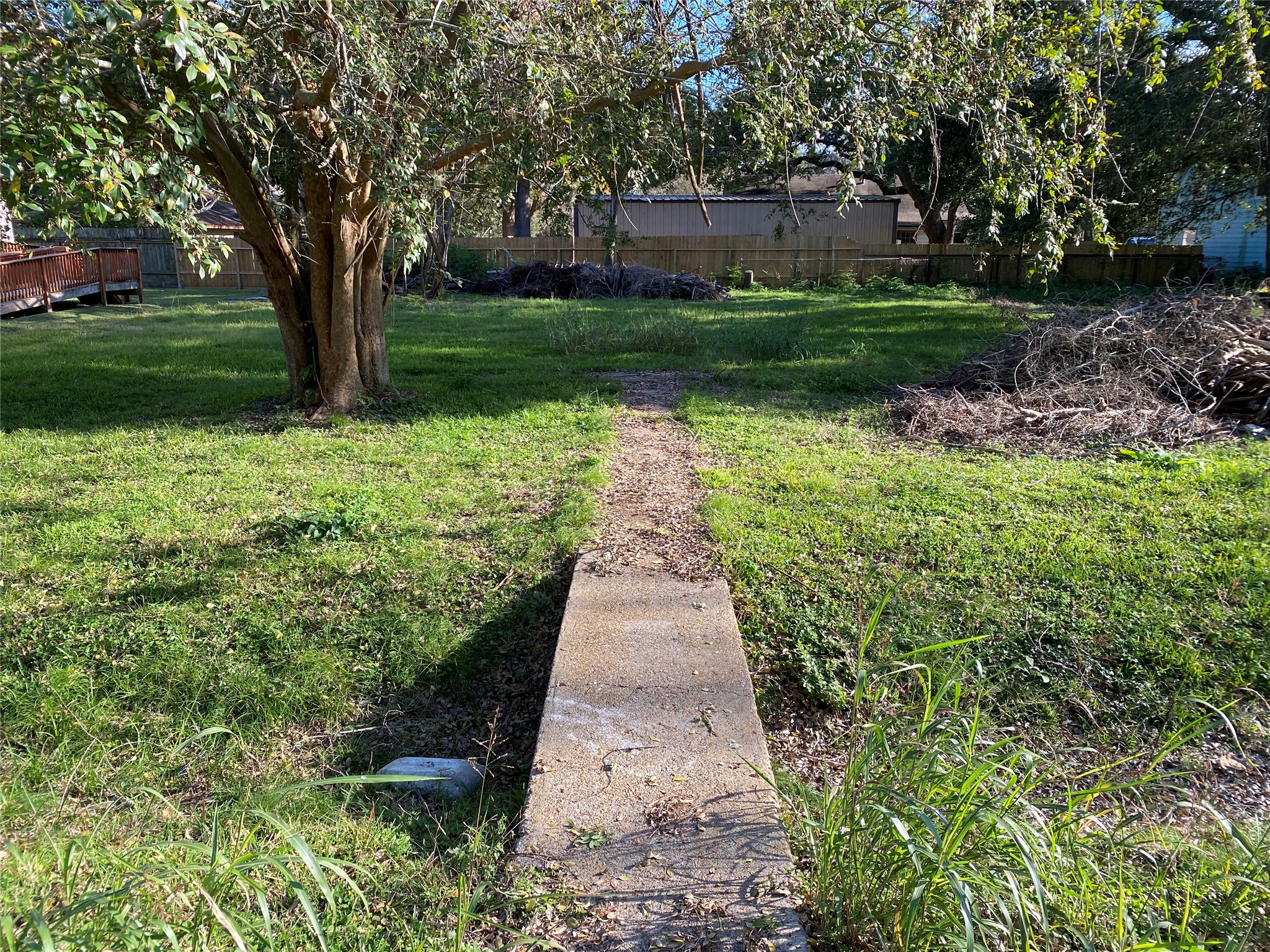 913 Chestnut Street La Marque, TX 77568 - Photo 1 of 2 a view of a pathway with a yard