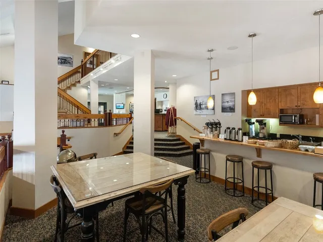 a view of a dining room with furniture