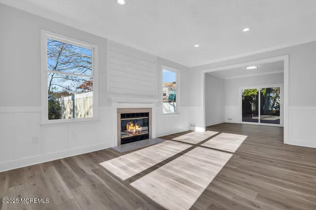 a view of livingroom with furniture and a fireplace