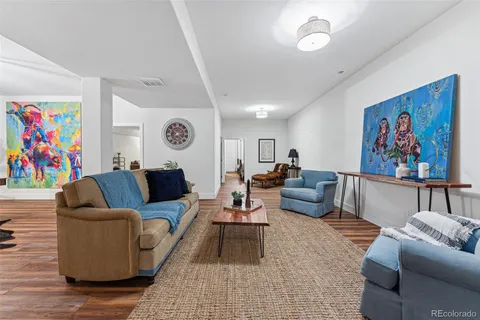a living room with furniture cabinets and a couch