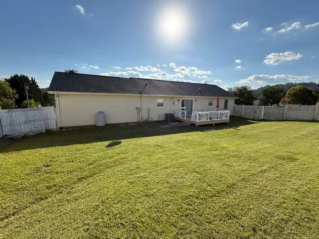 a view of a swimming pool and an outdoor space