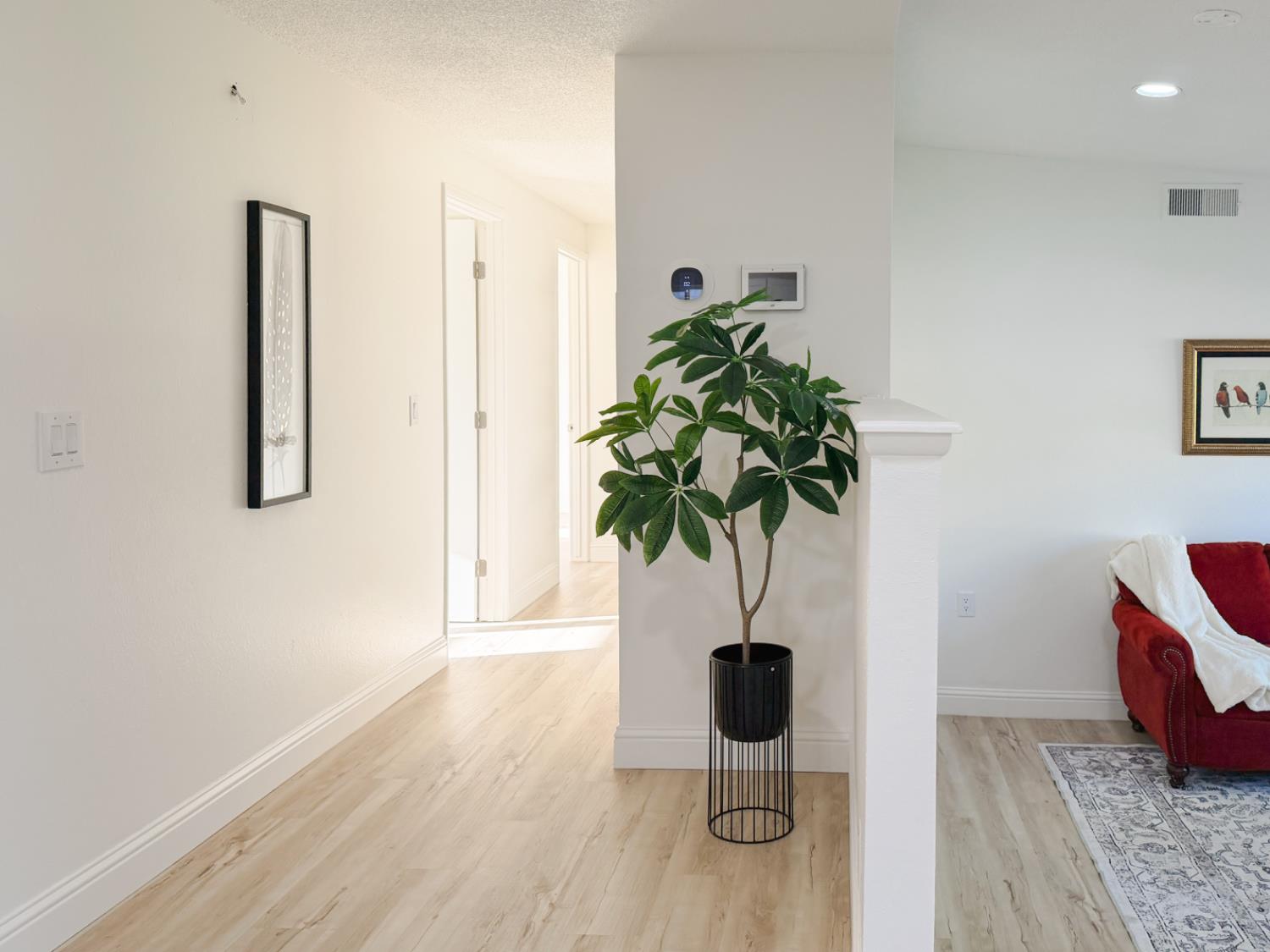 878 Carol Avenue Merced, CA 95341 - Photo 18 of 41 a view of entryway with wooden floor