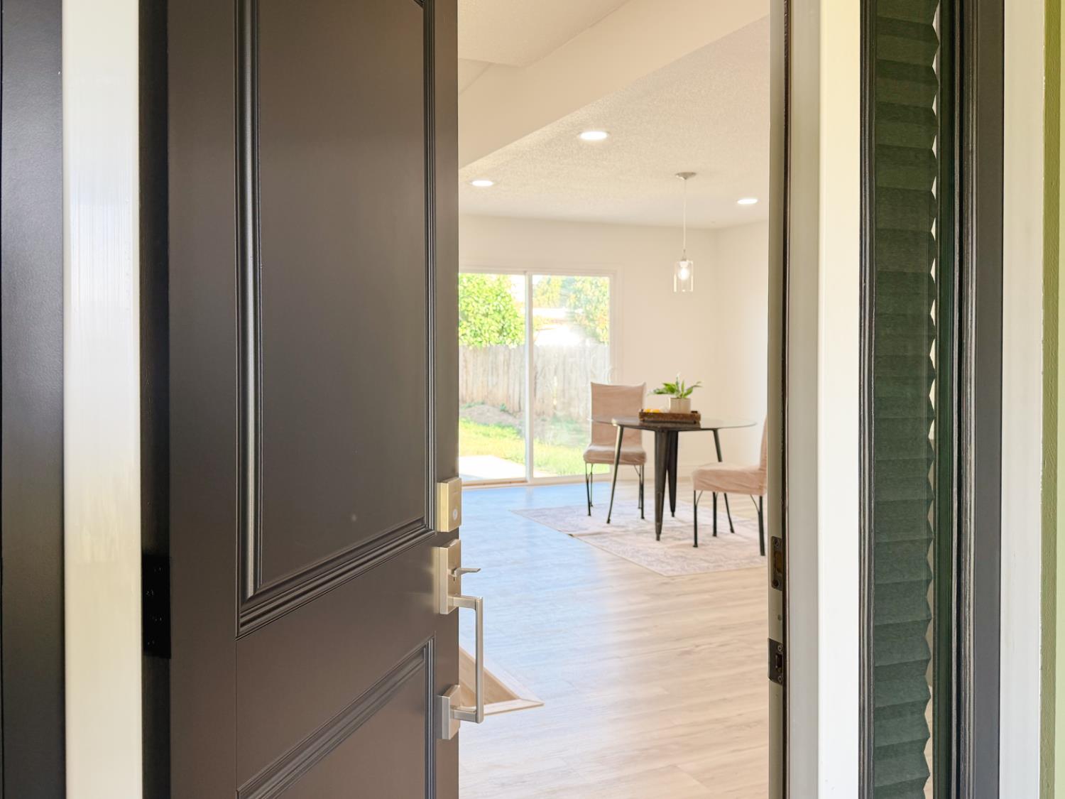 878 Carol Avenue Merced, CA 95341 - Photo 3 of 41 a dining room with furniture and a livingroom view