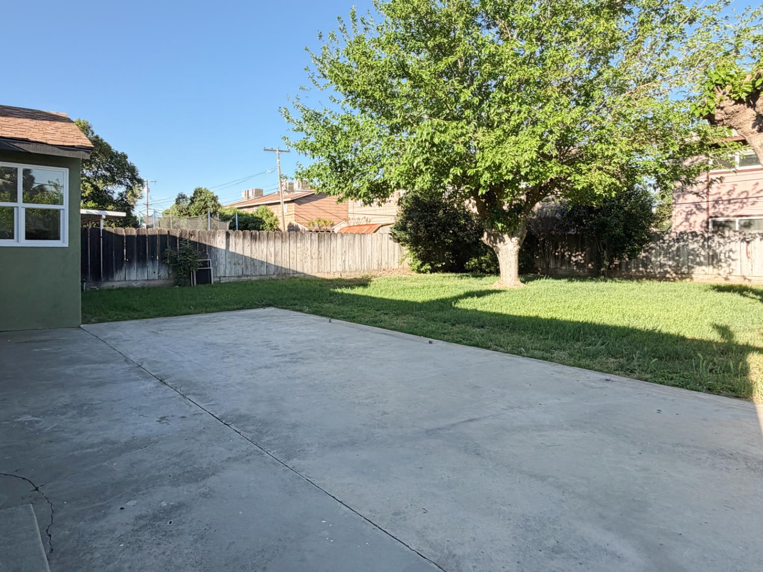 878 Carol Avenue Merced, CA 95341 - Photo 35 of 41 a view of a house with a yard and pathway