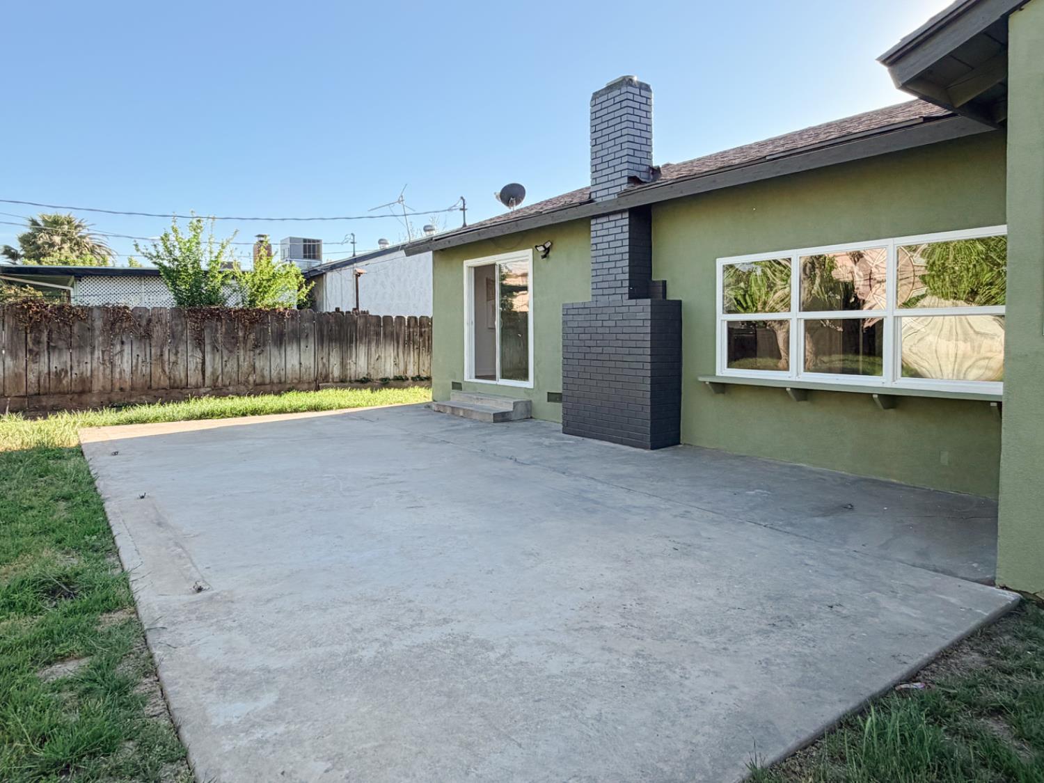 878 Carol Avenue Merced, CA 95341 - Photo 37 of 41 an outdoor view of house with swimming pool