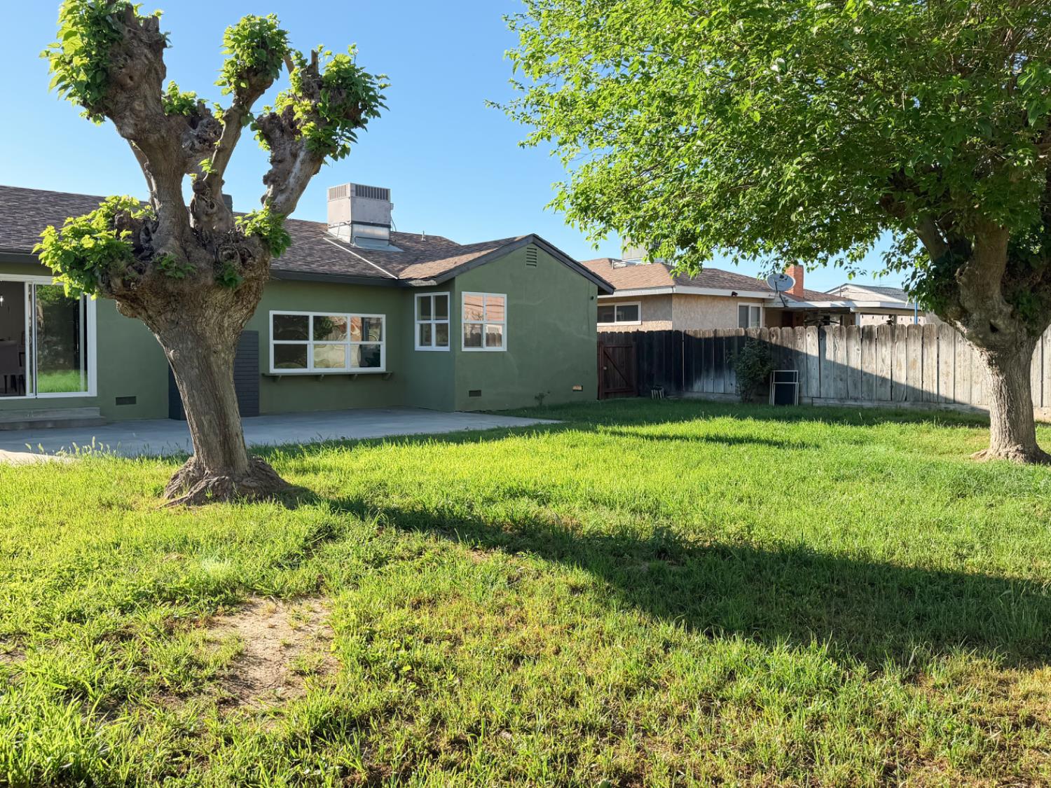 878 Carol Avenue Merced, CA 95341 - Photo 40 of 41 a house view with a garden space
