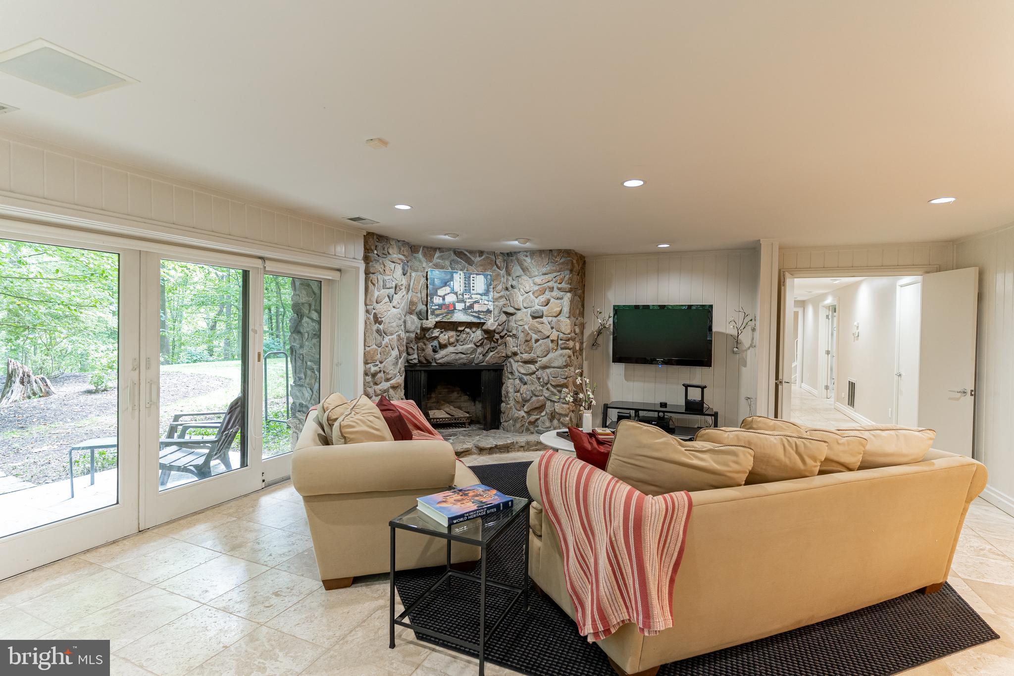 11615 Springridge Road Potomac, MD 20854 - Photo 27 of 38 Apartment Family Room w/Stone Fireplace