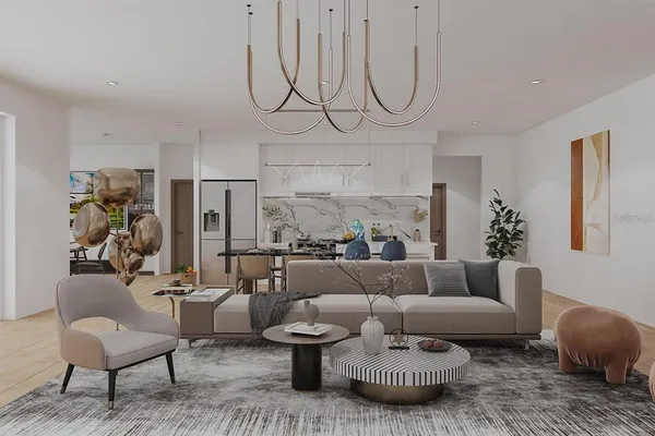 a living room with furniture a rug and a chandelier