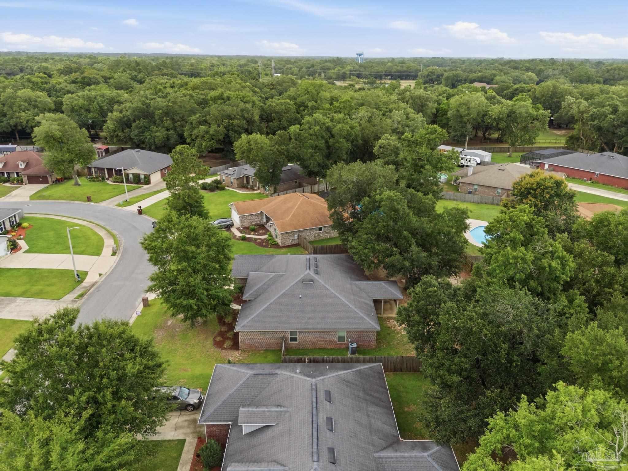 5661 Cane Syrup Circle Pace, FL 32571 - Photo 20 of 20 an aerial view of a house with outdoor space
