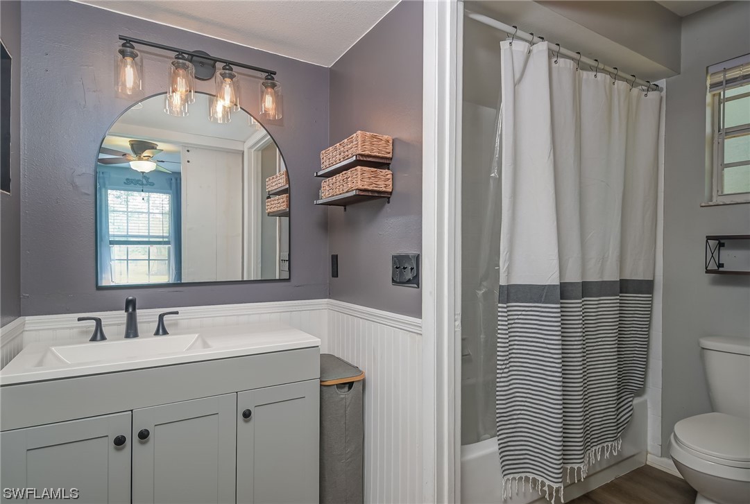 15780 Cemetery Road Fort Myers, FL 33905 - Photo 19 of 39 a bathroom with a sink a toilet and shower