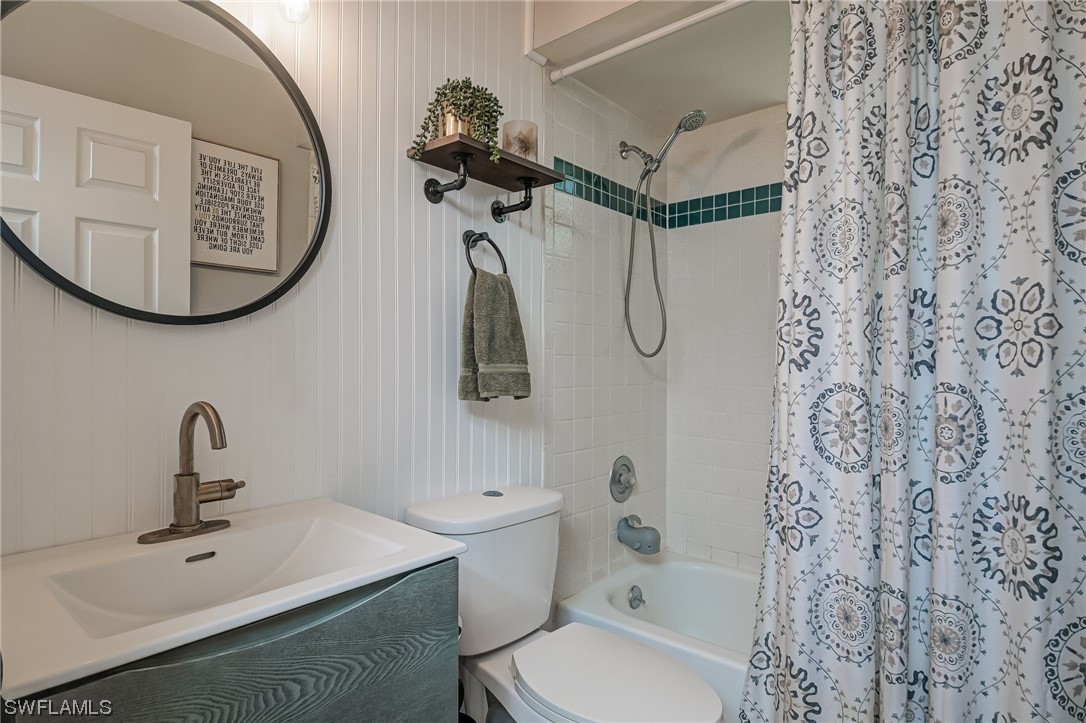 15780 Cemetery Road Fort Myers, FL 33905 - Photo 22 of 39 a bathroom with a toilet sink and mirror