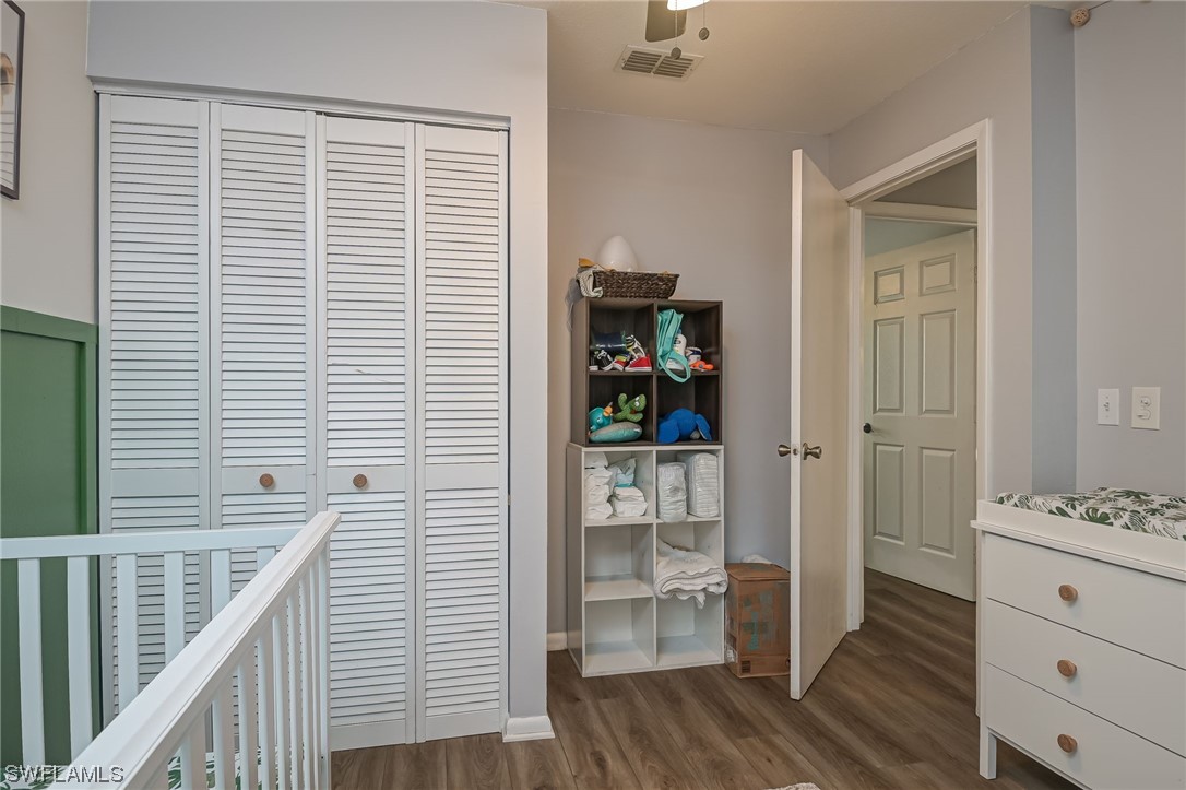 15780 Cemetery Road Fort Myers, FL 33905 - Photo 24 of 39 a view of a hallway with wooden floor and closet