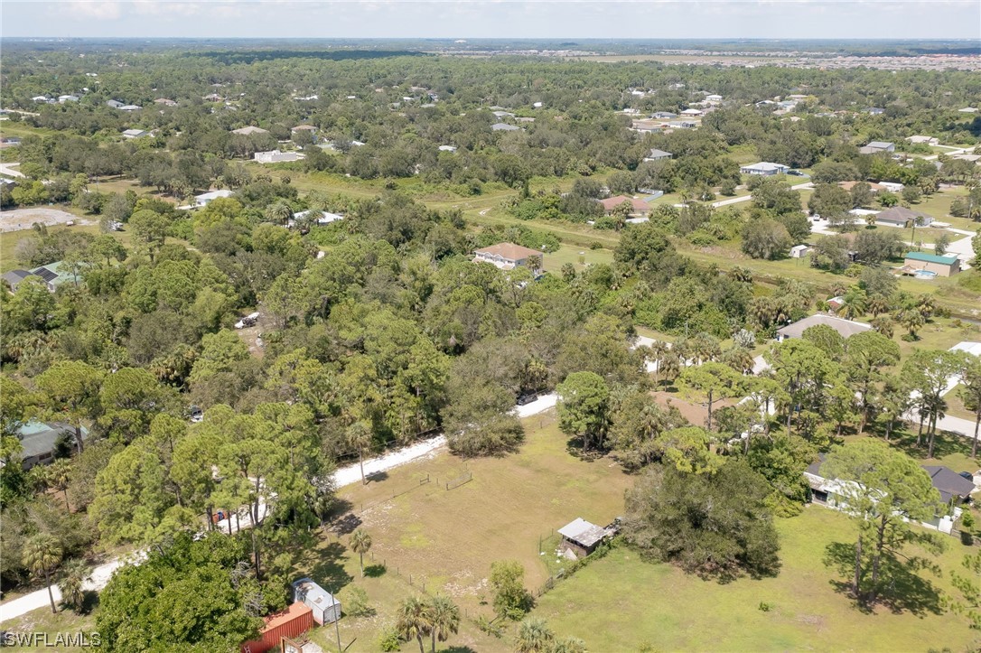 15780 Cemetery Road Fort Myers, FL 33905 - Photo 37 of 39 a view of a big yard with green space and mountain view in back