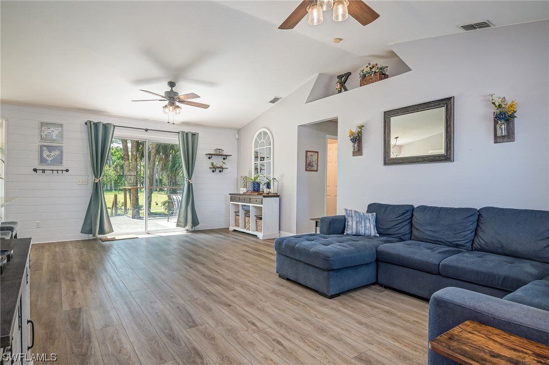 15780 Cemetery Road Fort Myers, FL 33905 - Photo 5 of 39 a living room with furniture and a large window