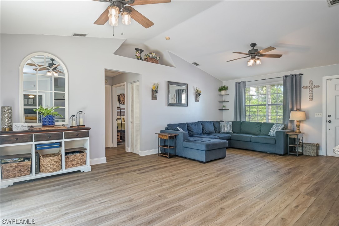 15780 Cemetery Road Fort Myers, FL 33905 - Photo 7 of 39 a living room with furniture and wooden floor