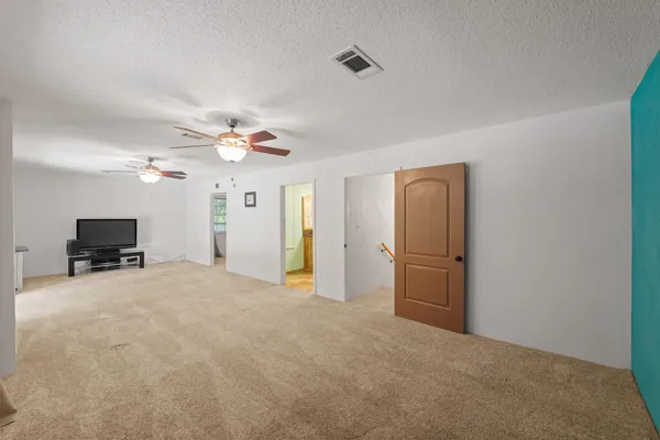 a view of a livingroom with a workspace