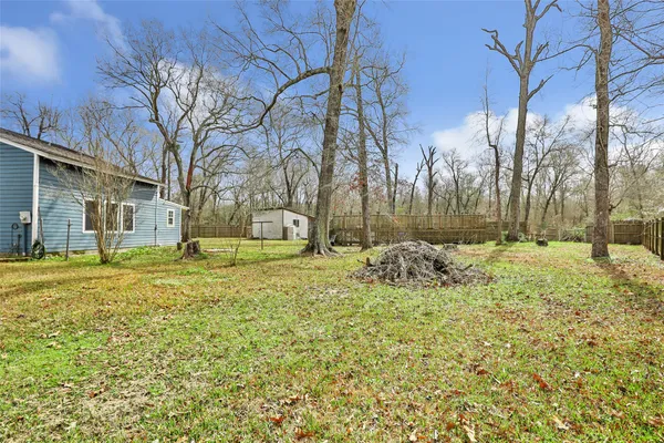 a fire hydrant in the middle of a field