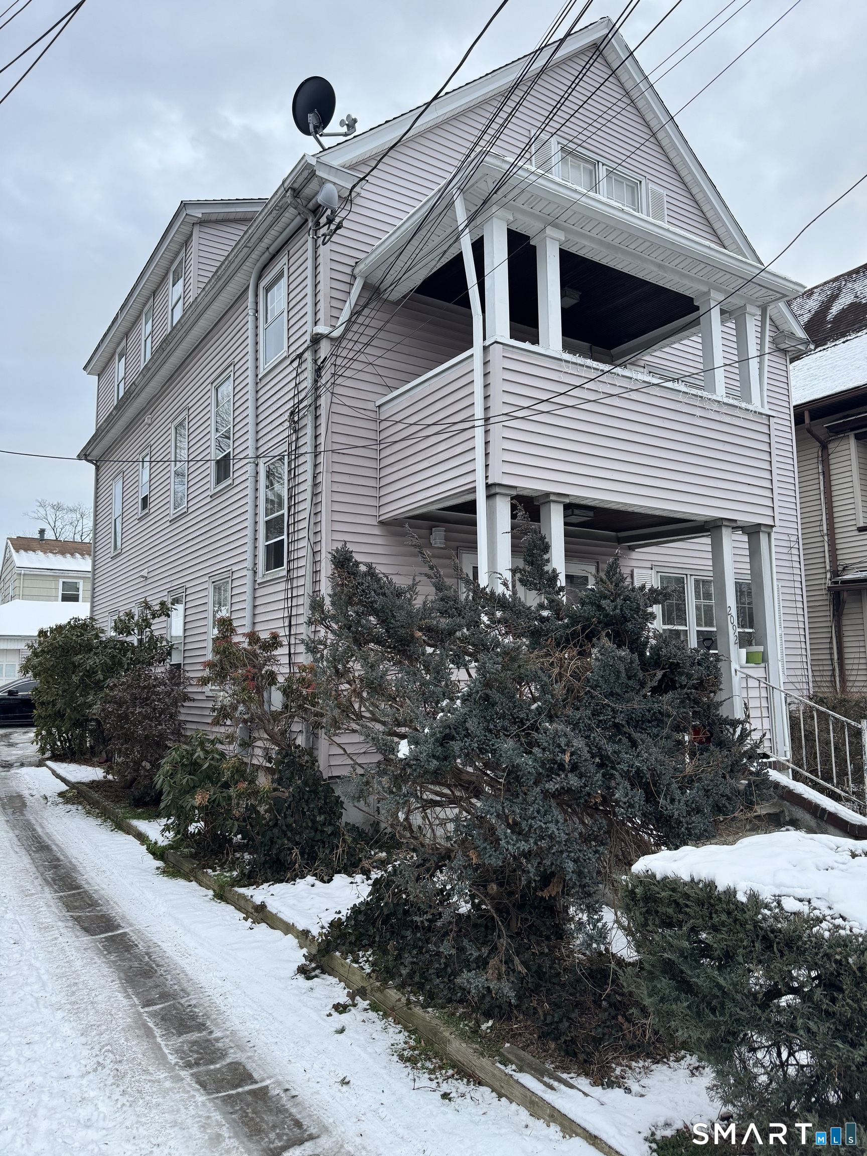 2092 East Main Street Bridgeport, CT 06610 - Photo 2 of 2 a house view with a outdoor space
