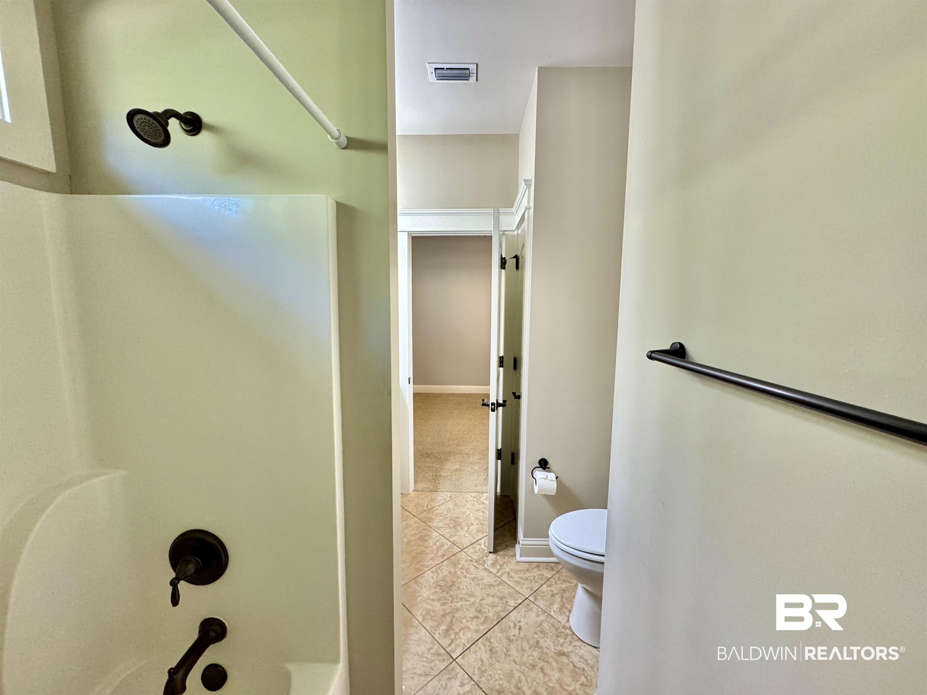 10846 County Road 138 Bay Minette, AL 36507 - Photo 10 of 53 Bathroom with toilet, a shower, and tile patterned flooring