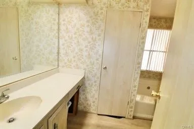 a bathroom with a sink and a tub