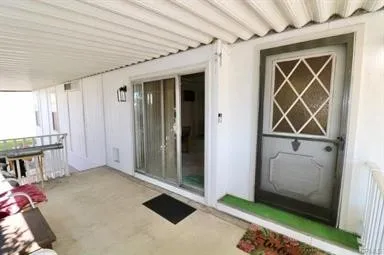 a view of an entryway with a workspace