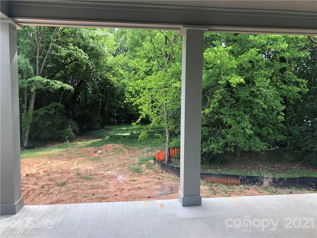 5520 Closeburn Road Charlotte, NC 28210 - Photo 12 of 32 a view of a back yard from a window