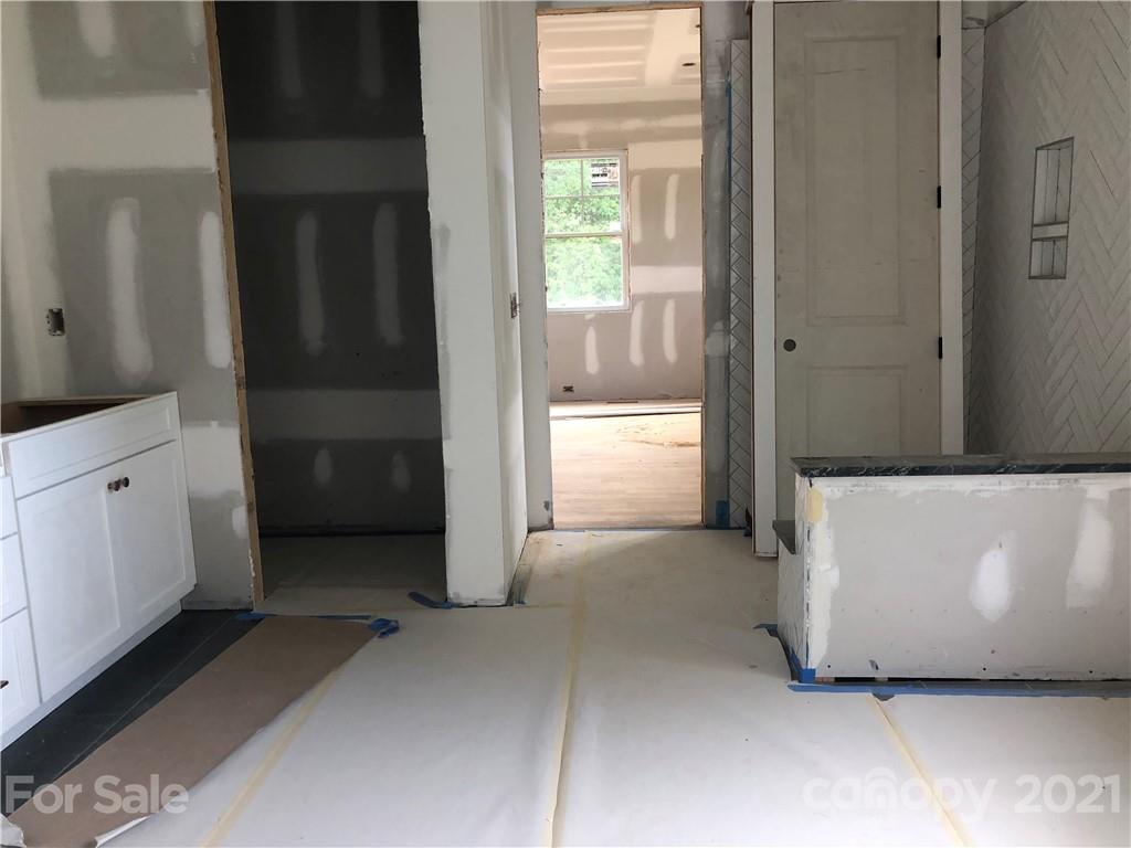 5520 Closeburn Road Charlotte, NC 28210 - Photo 17 of 32 a view of an empty room and window