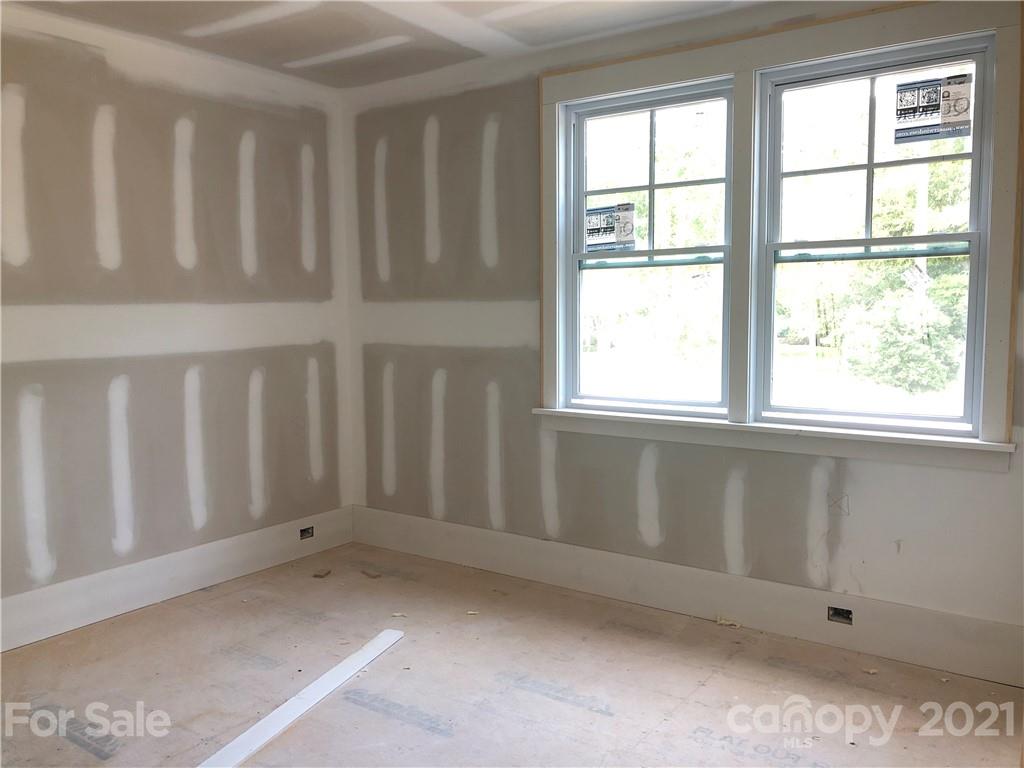 5520 Closeburn Road Charlotte, NC 28210 - Photo 22 of 32 a view of an empty room with a window