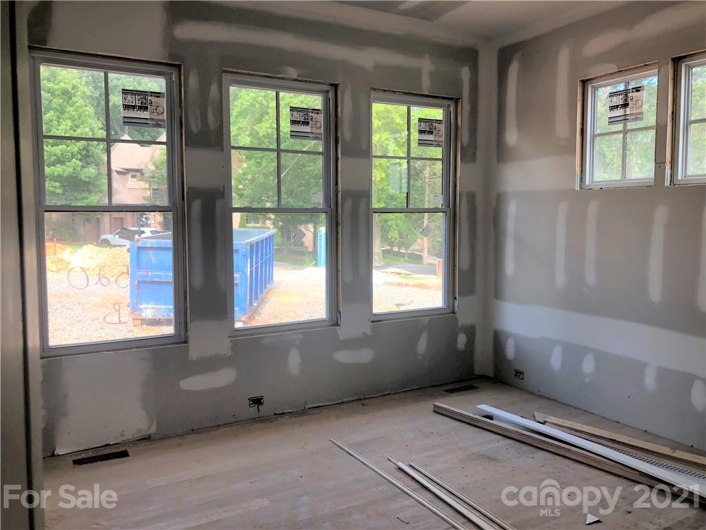 5520 Closeburn Road Charlotte, NC 28210 - Photo 4 of 32 a view of an empty room with a window